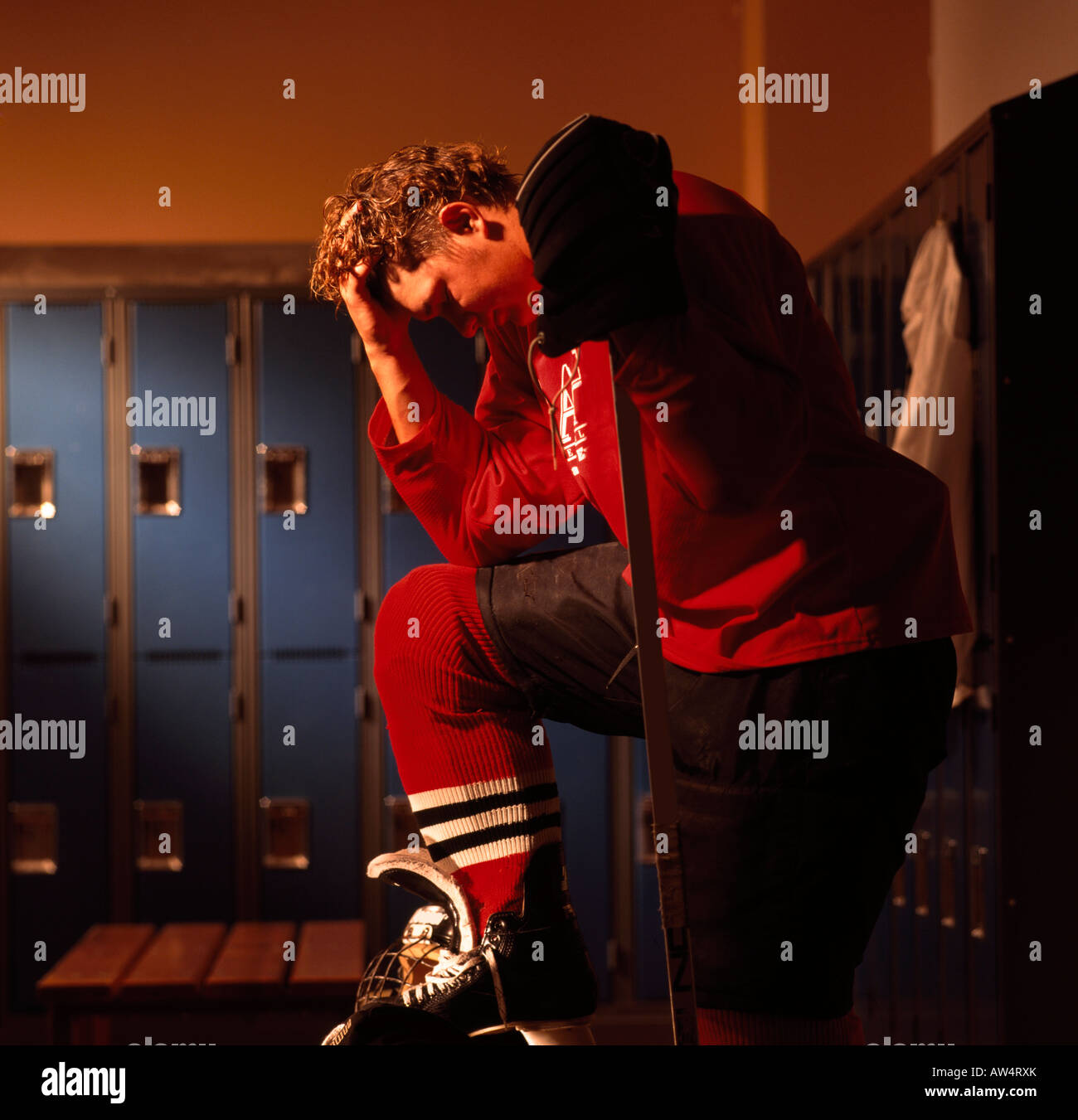 Hockey player in dressing room Stock Photo