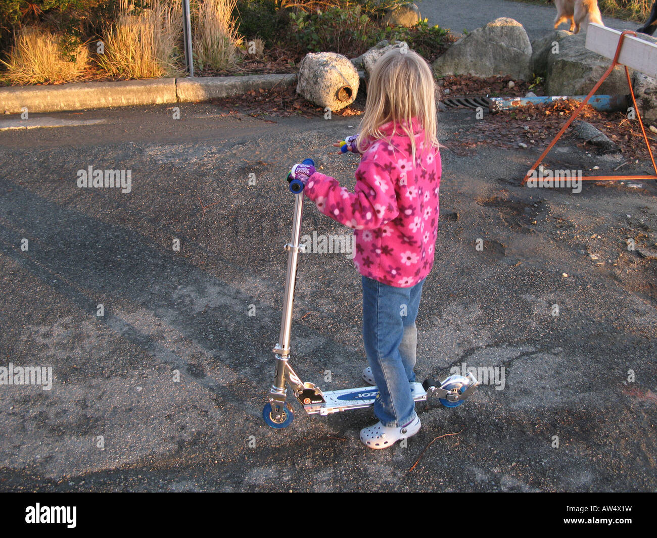 West Vancouver, BC, Canada Young girl on her Razor scooter Stock Photo
