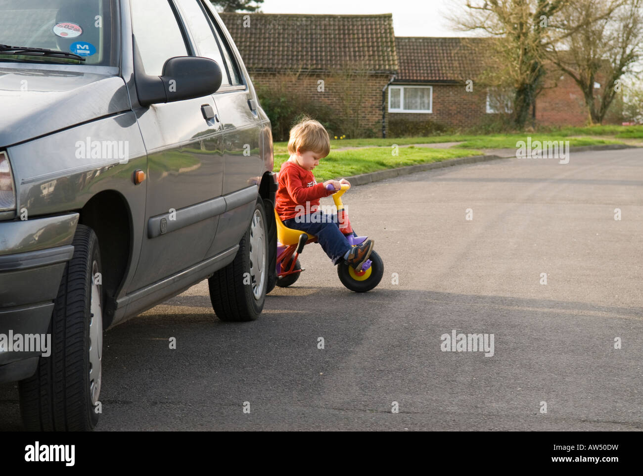 Child behind car hires stock photography and images Alamy