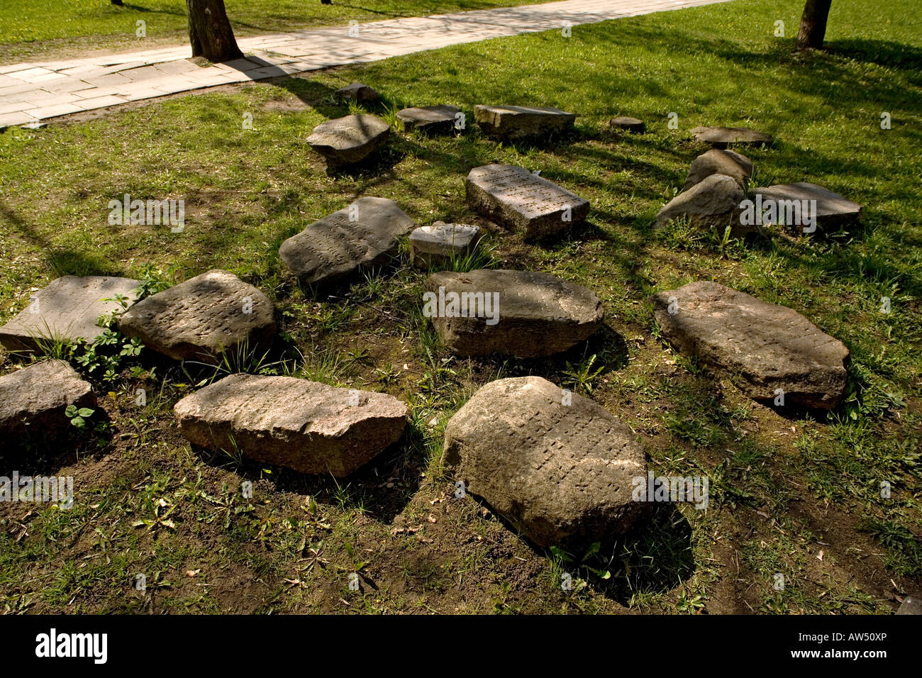 Broken gravestones at the old Jewish cemetery  that is now a public park in Minsk Belarus Stock Photo