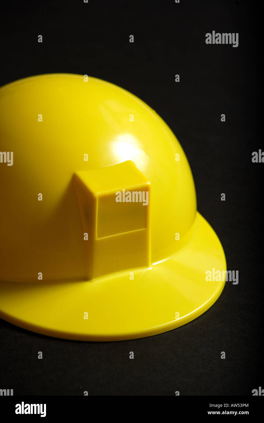 A yellow Hard Hat in the studio Stock Photo Alamy