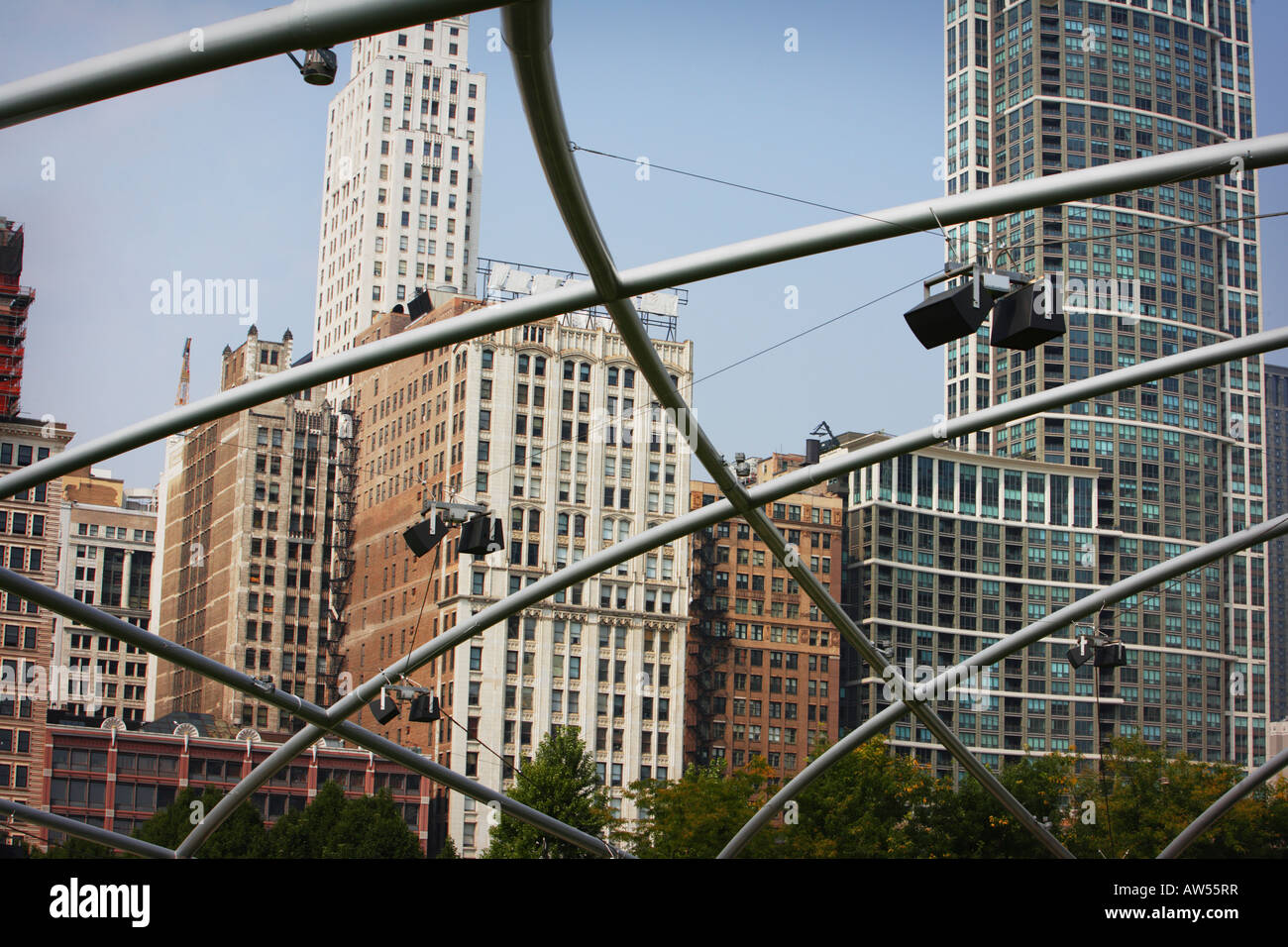 Chicago cityscape looking through Jay Pritzker Pavilion trellis, Illinois, USA Stock Photo