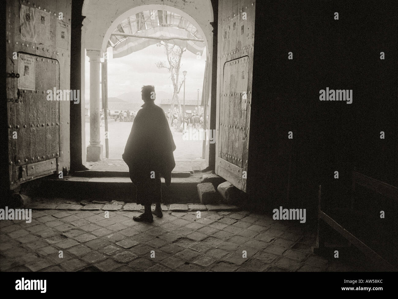 man wearing poncho Stock Photo - Alamy