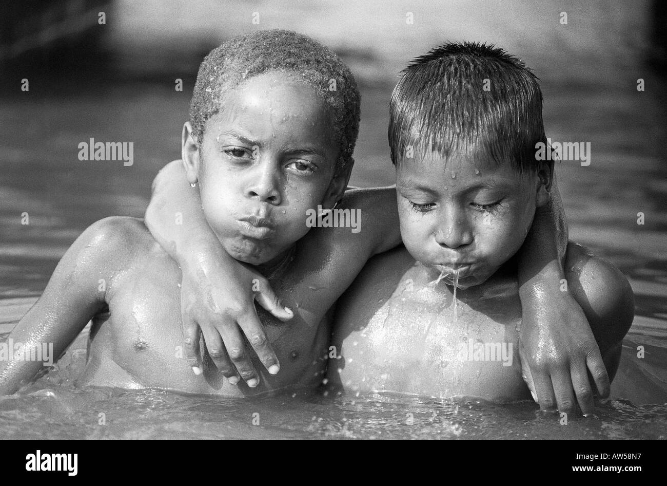 Indigenous children water Black and White Stock Photos & Images - Alamy