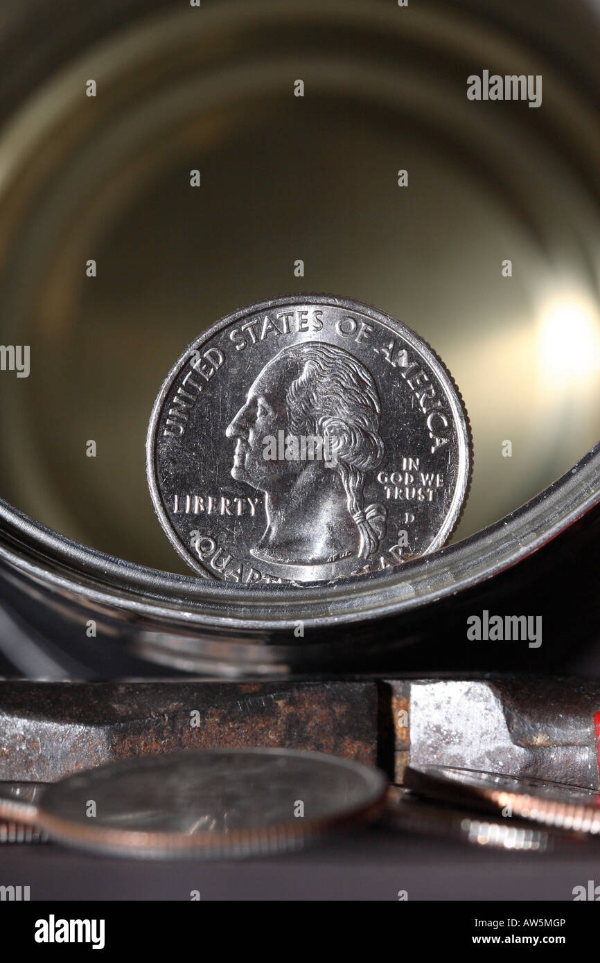 US American quarter dollar coin in a metal can Stock Photo Alamy