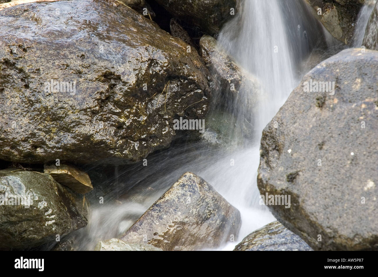 Water amongst rocks Stock Photo - Alamy