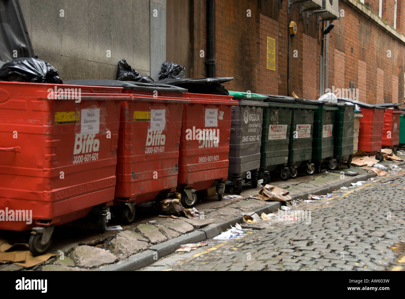 commercial waste bins in a birmingham street Stock Photo Alamy