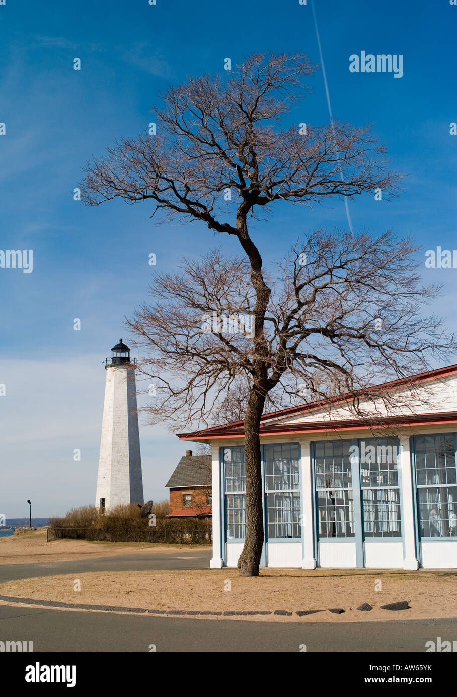 The Lighthouse and carousel building with tree at Lighthouse Point Park in New Haven, Connecticut USA. Very High Resolution. Stock Photo