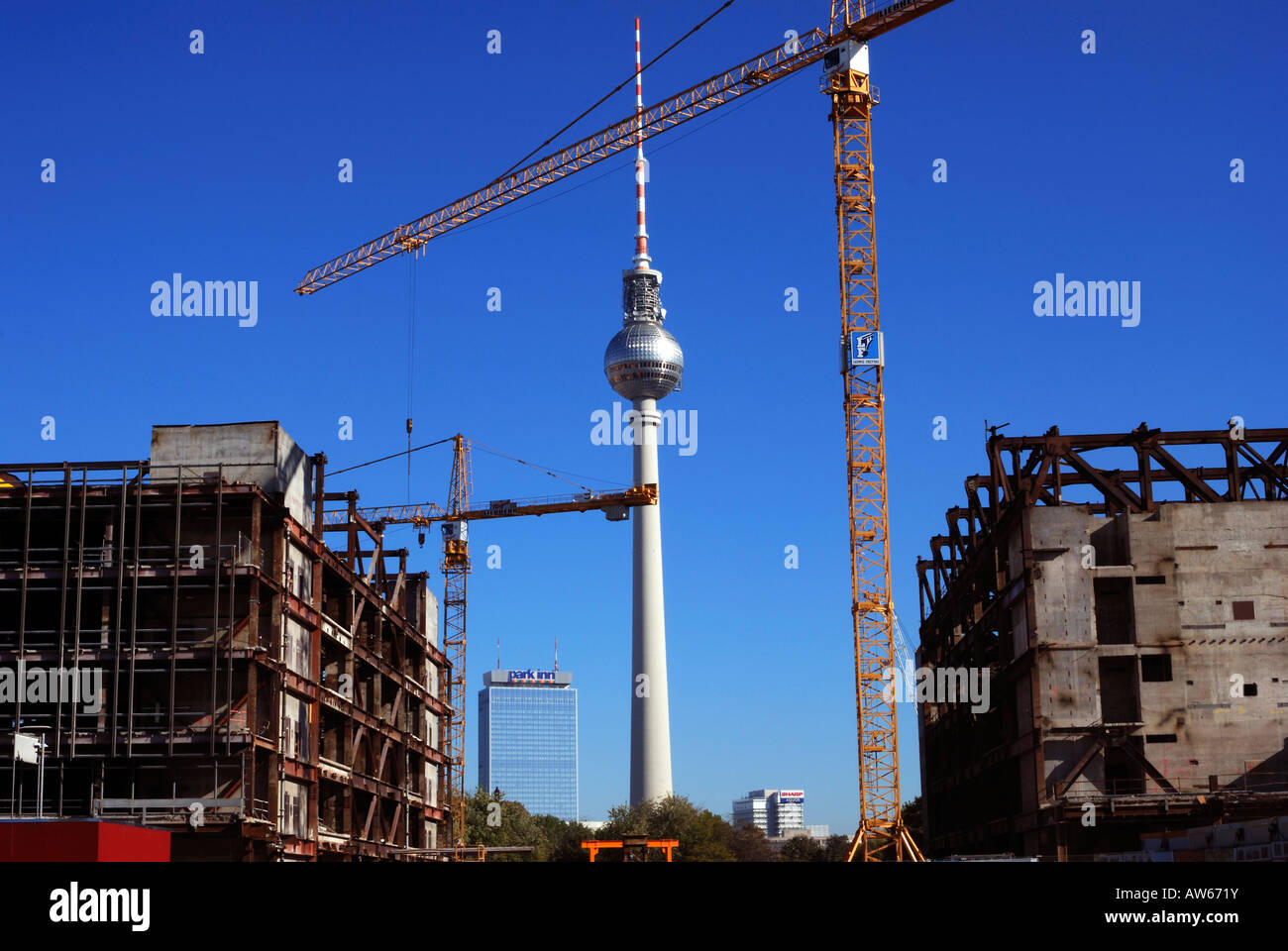 Berlin's futuristic tv tower emerging between the ruins of the Palast der Republik, Germany. Stock Photo