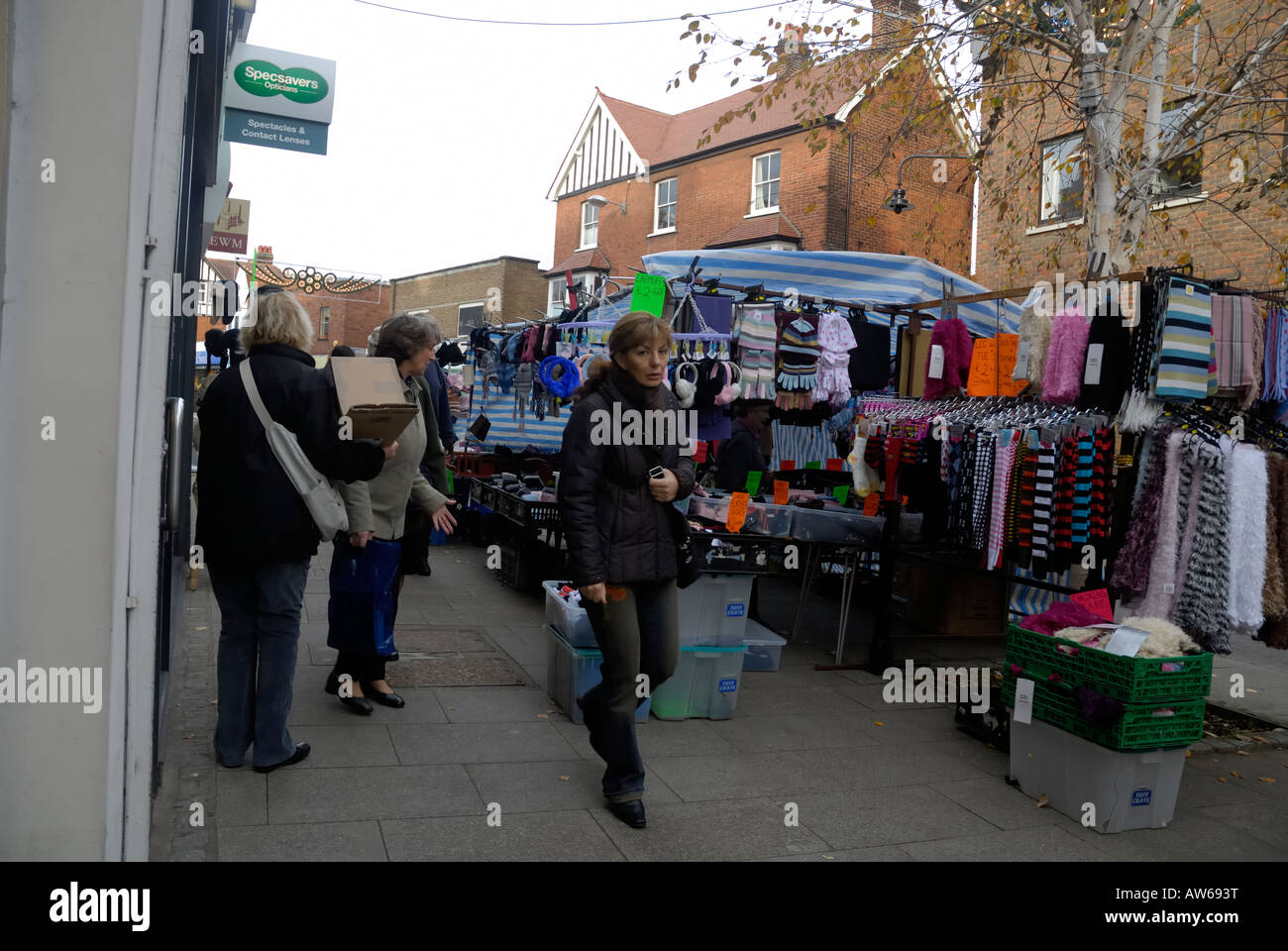 Woman looking at photographer during Market Day in Bishops Stortford Hertfordshire Stock Photo