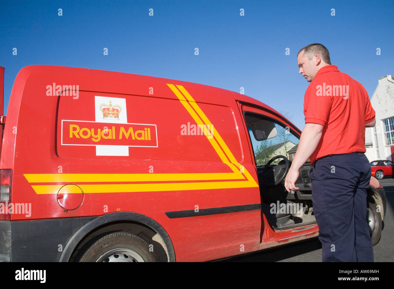 Postman post man working Red tee shirt GPO. Horizontal Narberth Post