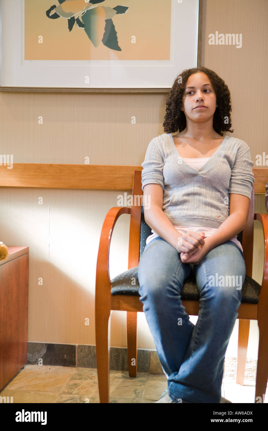 Girl in waiting room Stock Photo - Alamy