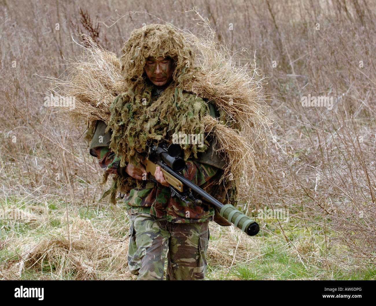 British Infantryman with a long range sniper rifle L115A3 which has a killing capability from over a mile. Stock Photo