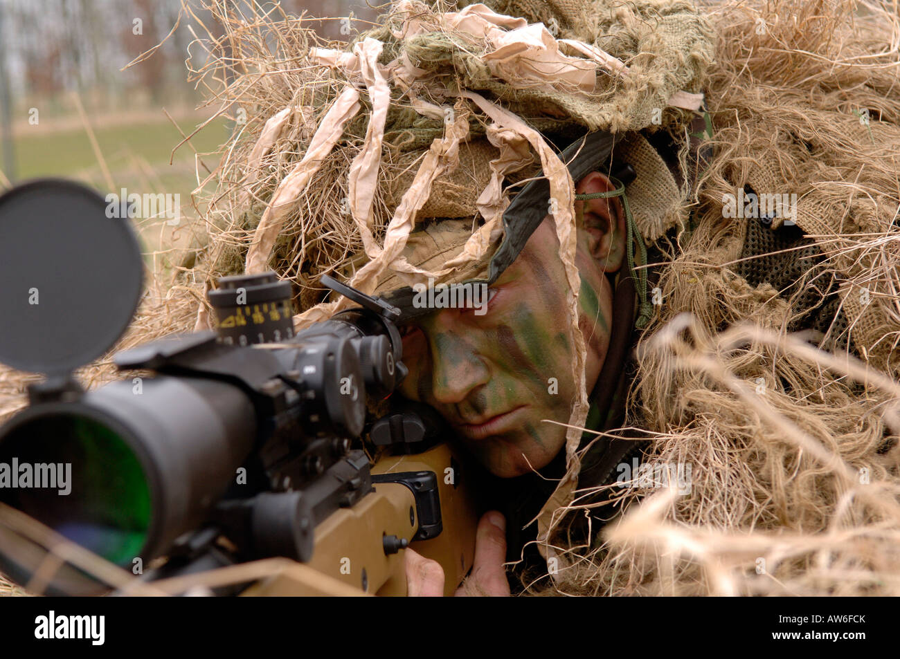 British Infantryman with a long range sniper rifle L115A3 which has a killing capability from over a mile. Stock Photo