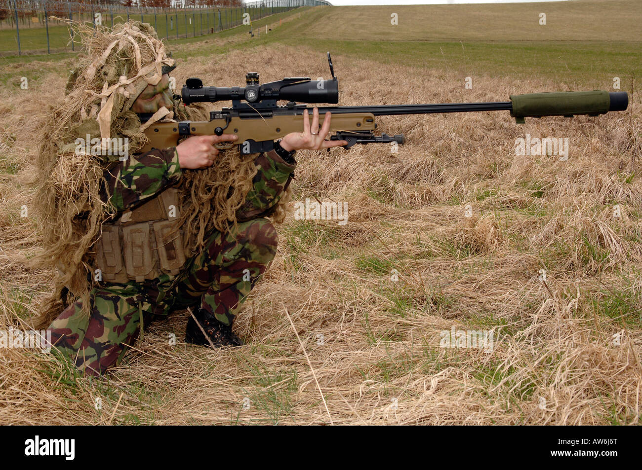 British Infantryman with a long range sniper rifle L115A3 which has a killing capability from over a mile. Stock Photo