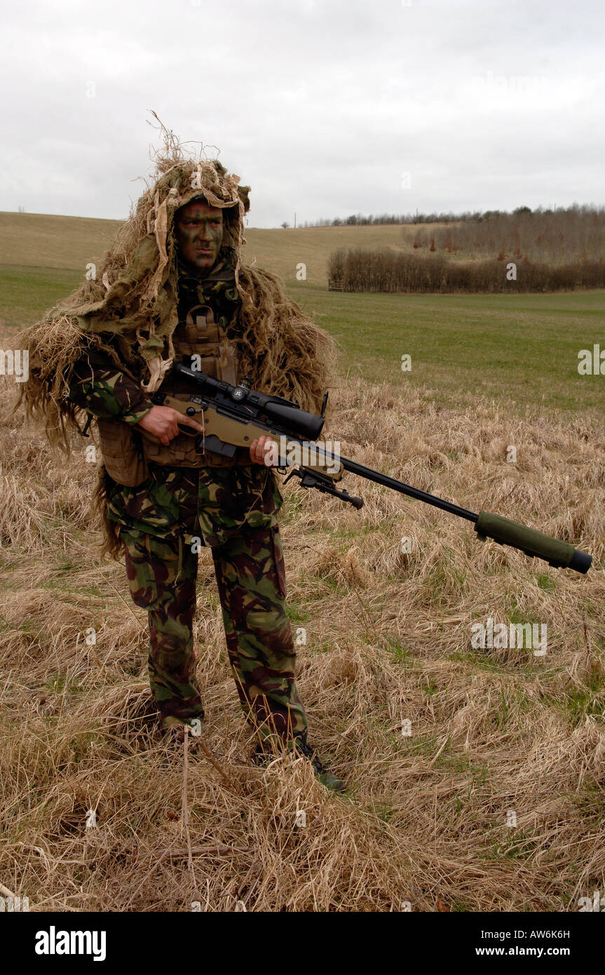 British Infantryman with a long range sniper rifle L115A3 which has a killing capability from over a mile. Stock Photo