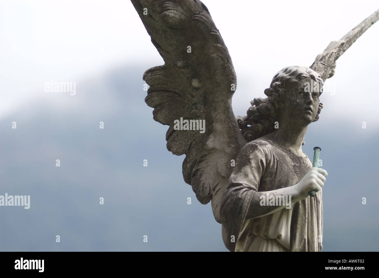 Statue of an angel in the Morcote, Switzerland, cemetary Stock Photo - Alamy
