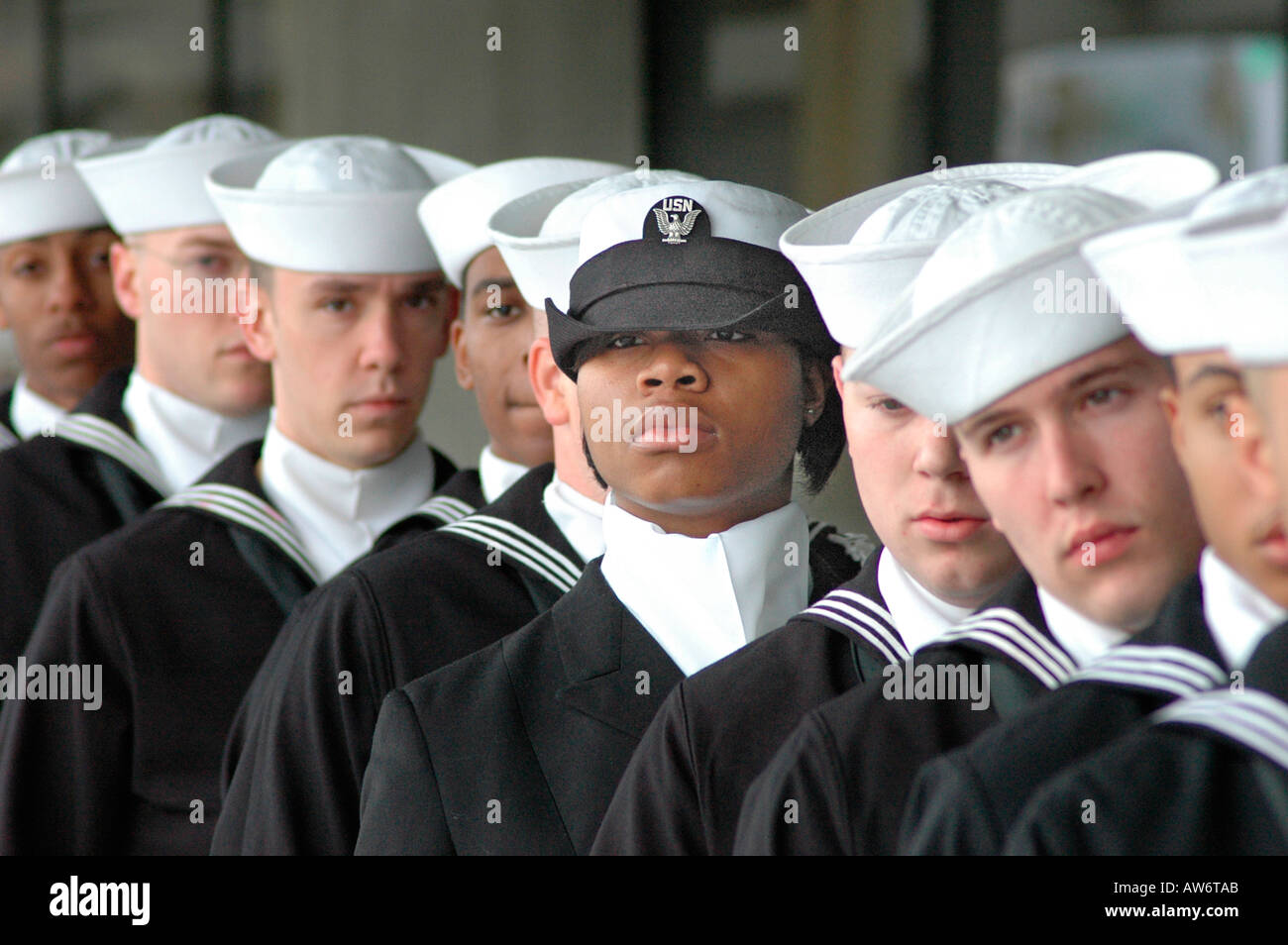 Real high school female girl Students in the real Navy Navel ROTC Military corps marching with the flags at parade in Atlanta Georgia USA America Stock Photo