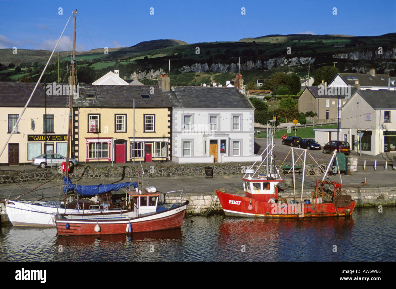 A harbor scene in Carnlough along the Antrim Coast in Northern Ireland. Stock Photo