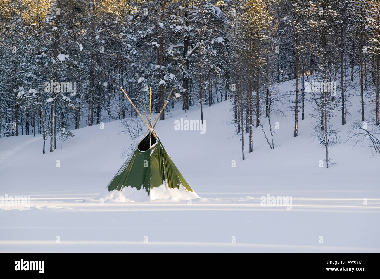 A tepee shelter in winter in Saariselka Northern Finland Climate change has already raised average temperatures by 0 7 oC Stock Photo