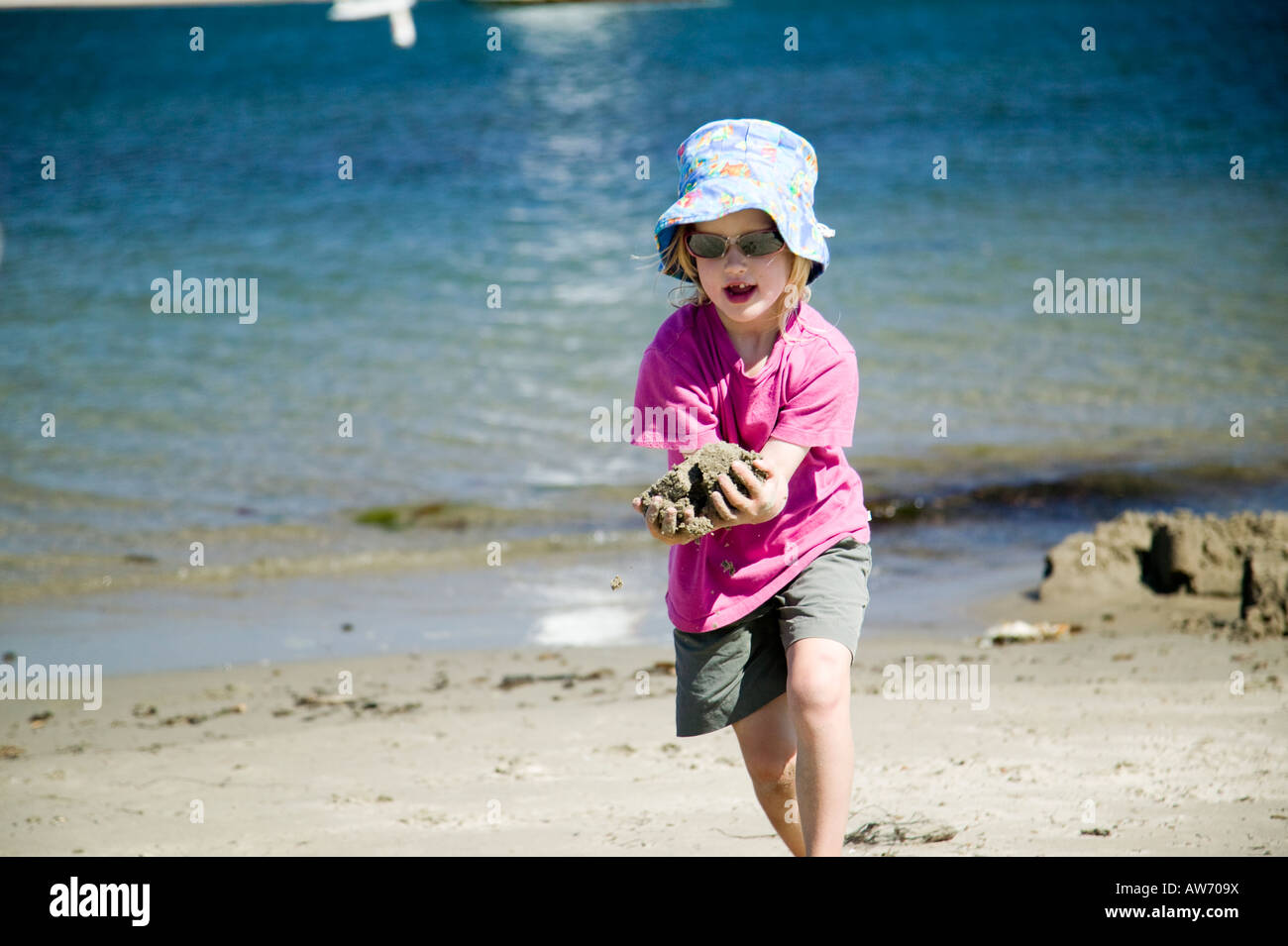 Girl playing on a beach Santa Barbara, California, USA Stock Photo