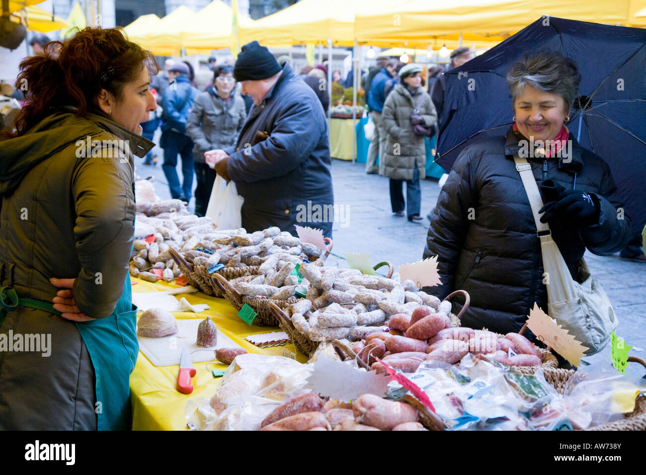 Shoppers at an organic and specialist food market Turin Italy Stock Photo