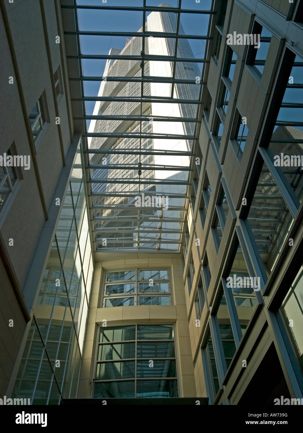 view through vitrious roof of a corridor to the building of Commerzbank in Frankfurt am Main Hessen Germany Stock Photo