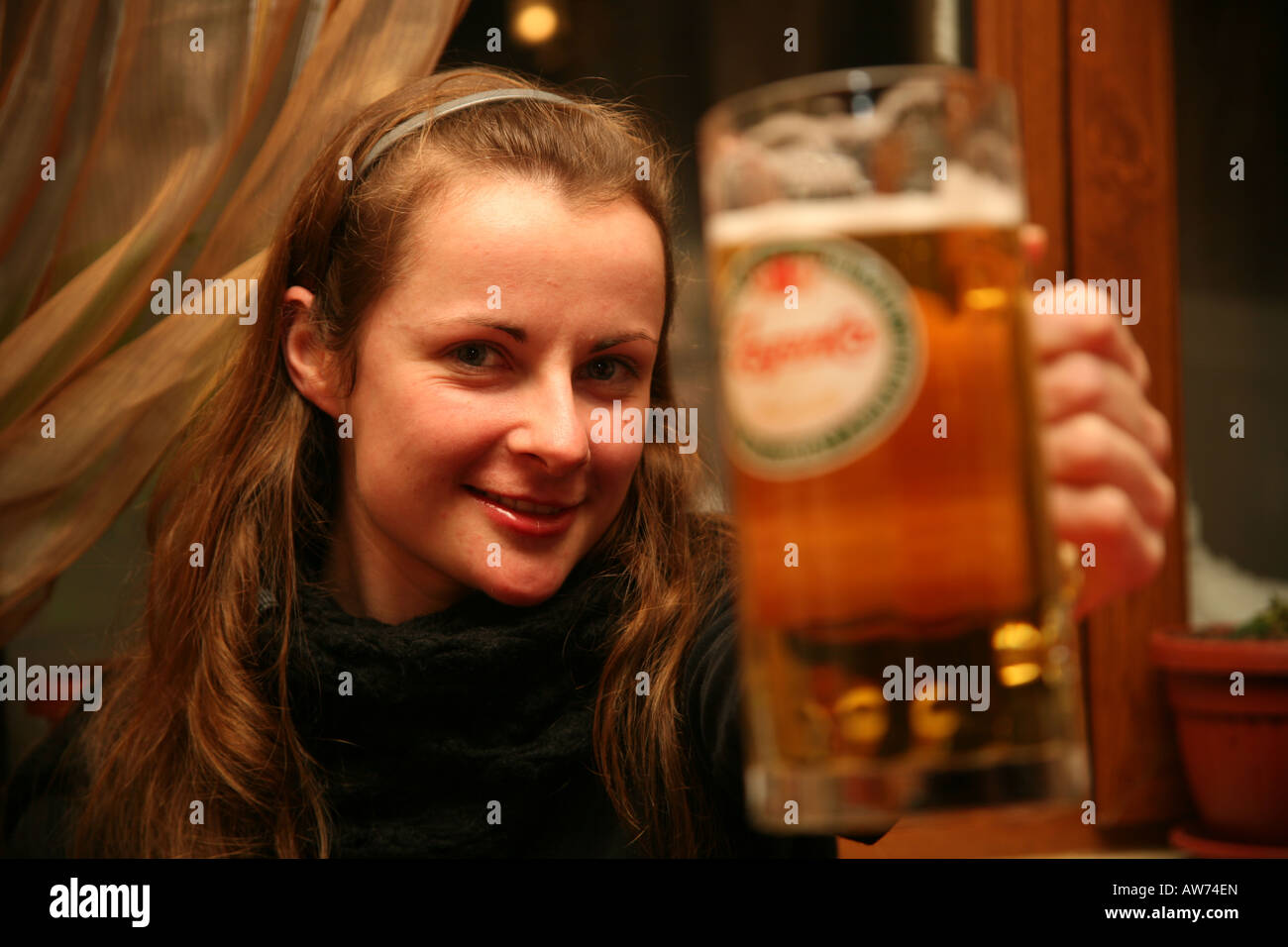 Girl drinking beer Stock Photo Alamy