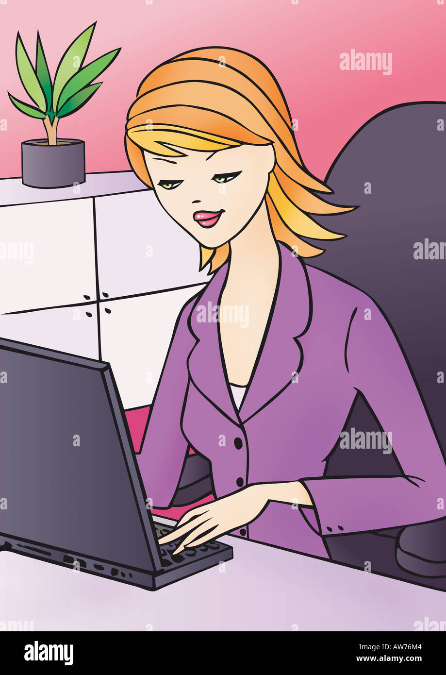 Young woman at laptop in office Stock Photo