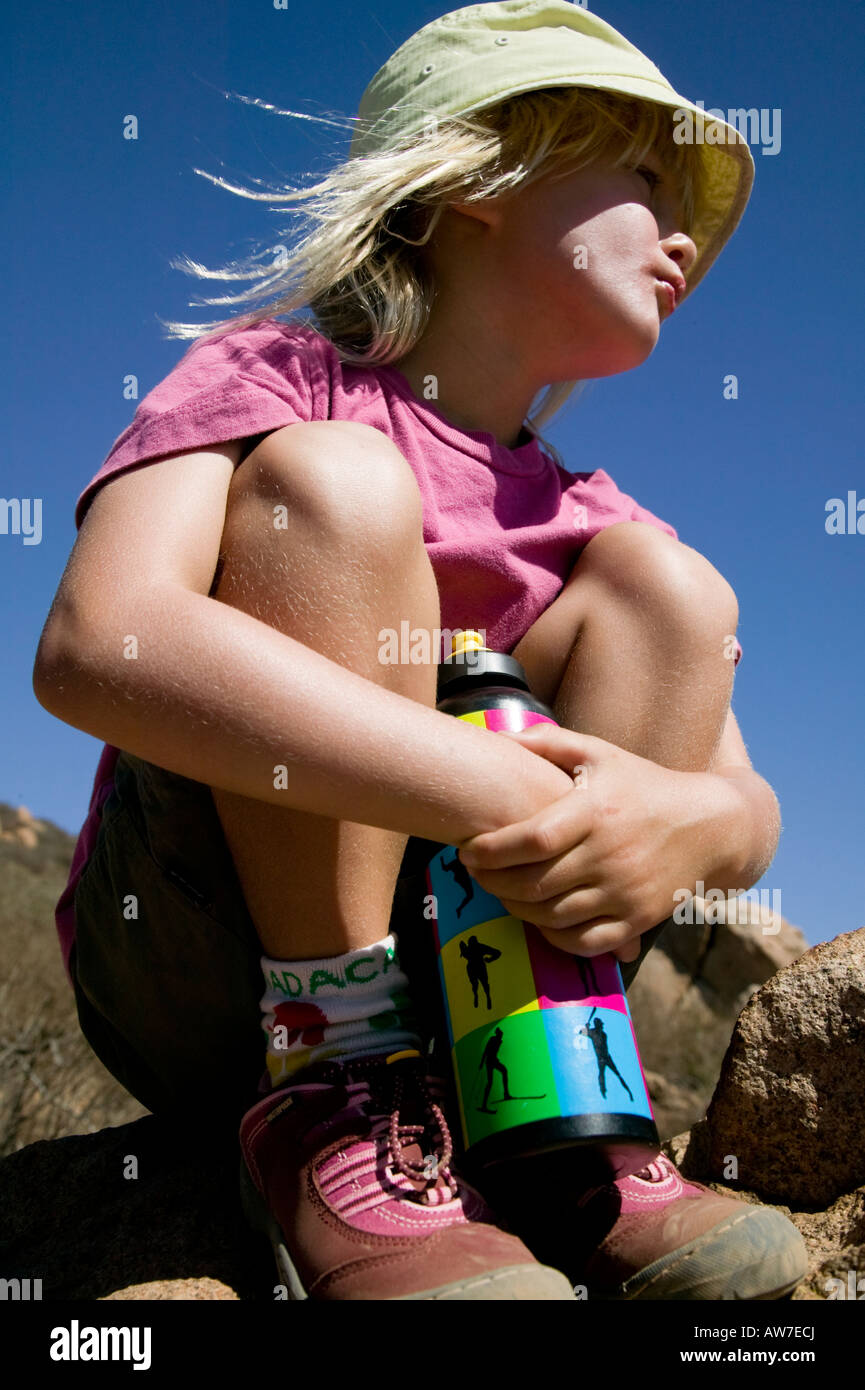 Girl resting on trail walk Mission Trails Cowles Mountain San Diego, California, USA Stock Photo
