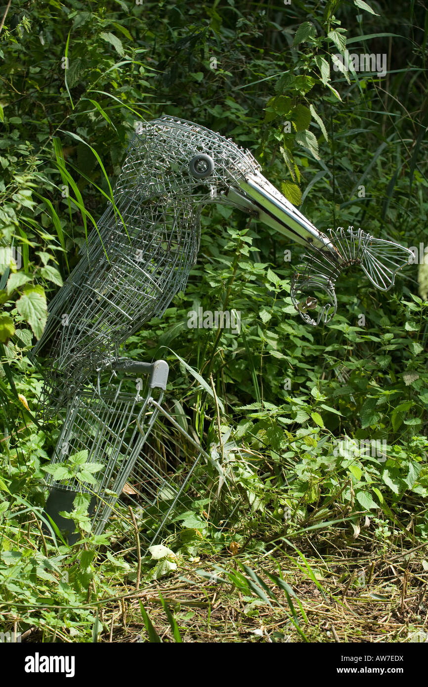 Common Kingfisher sculpture fashioned from old shopping trolleys Stock Photo