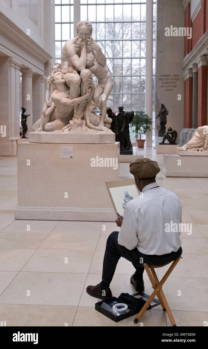 Artist Sketching Ugolino and His Sons by Jean Baptiste Carpeaux at the Metropolitan Museum of Art in NYC Stock Photo
