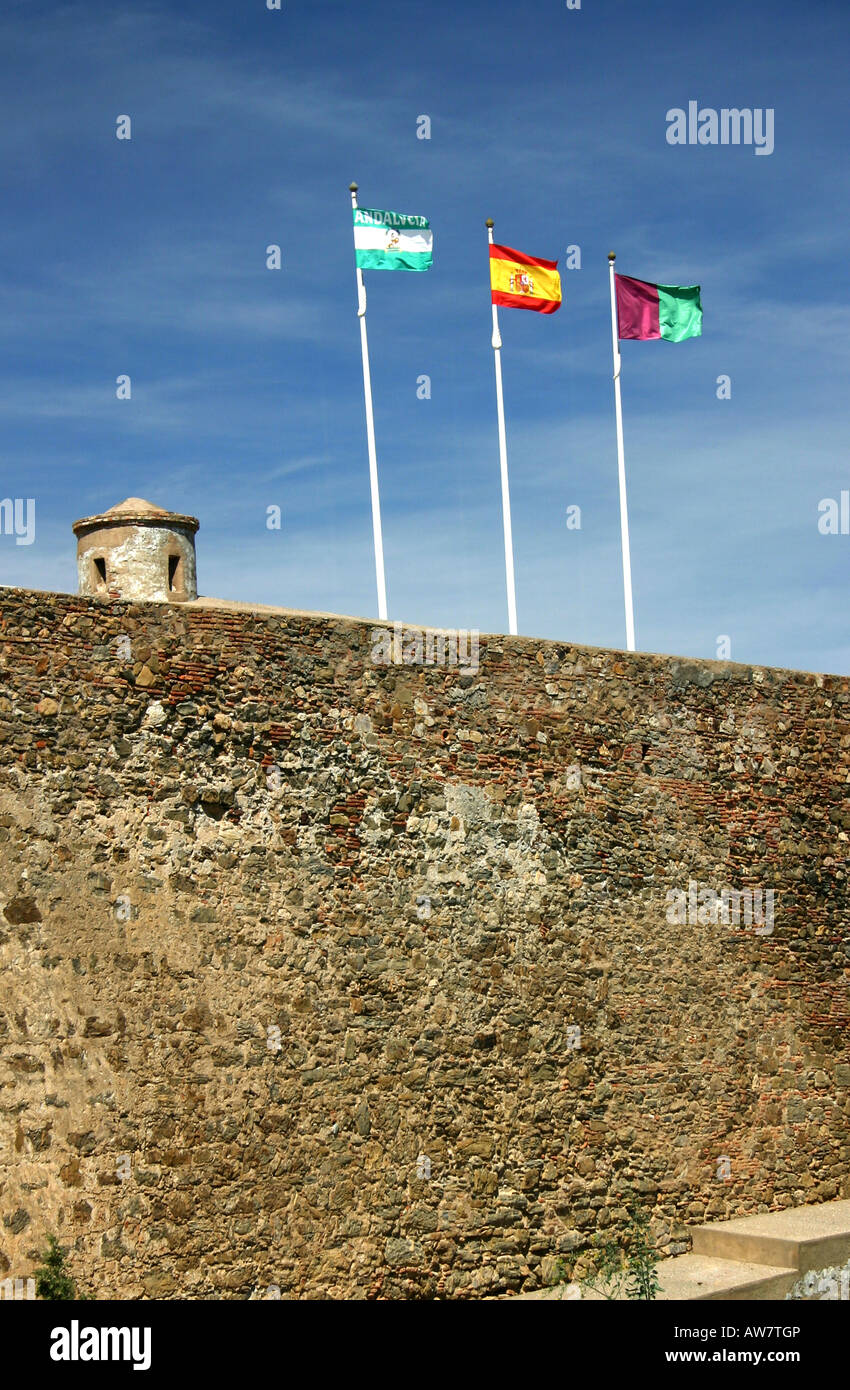 Flags flying at Castillo de Gibralfaro, Monte del Faro, Malaga, Andalucia, Southern Spain. Stock Photo