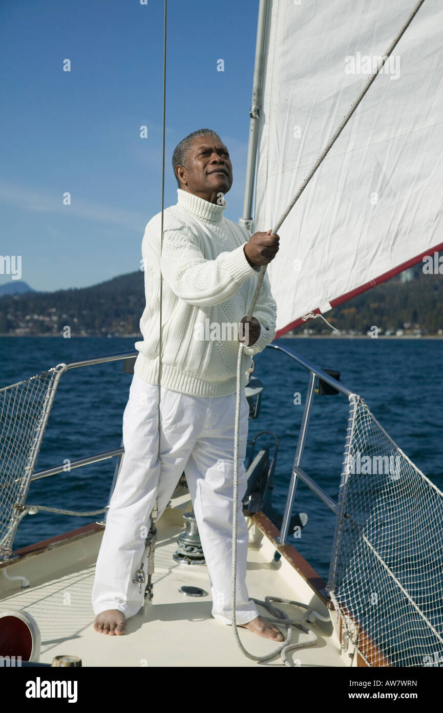 Senior man sailing West Vancouver, BC, Canada Stock Photo