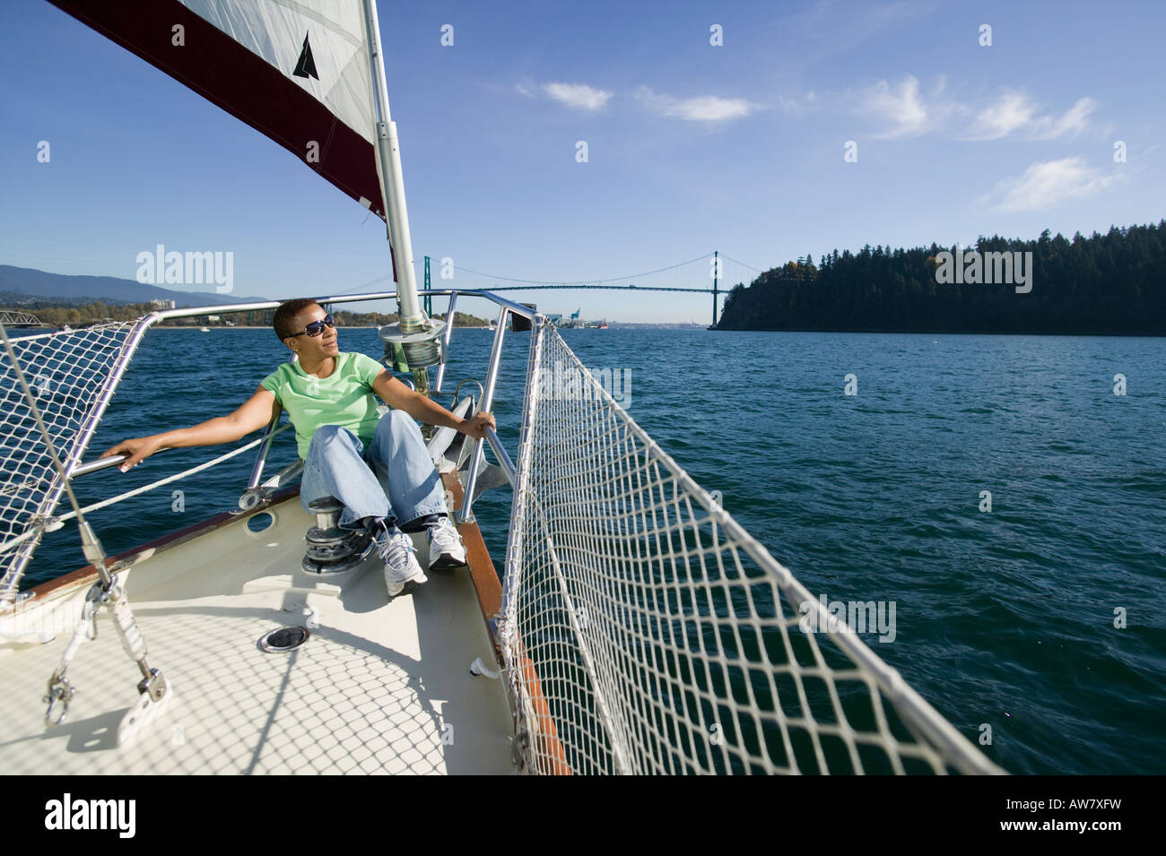 Senior woman sailing West Vancouver, BC, Canada Stock Photo