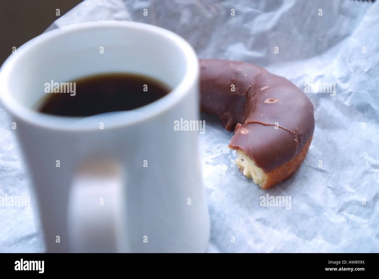 Food Coffee and a donut Stock Photo