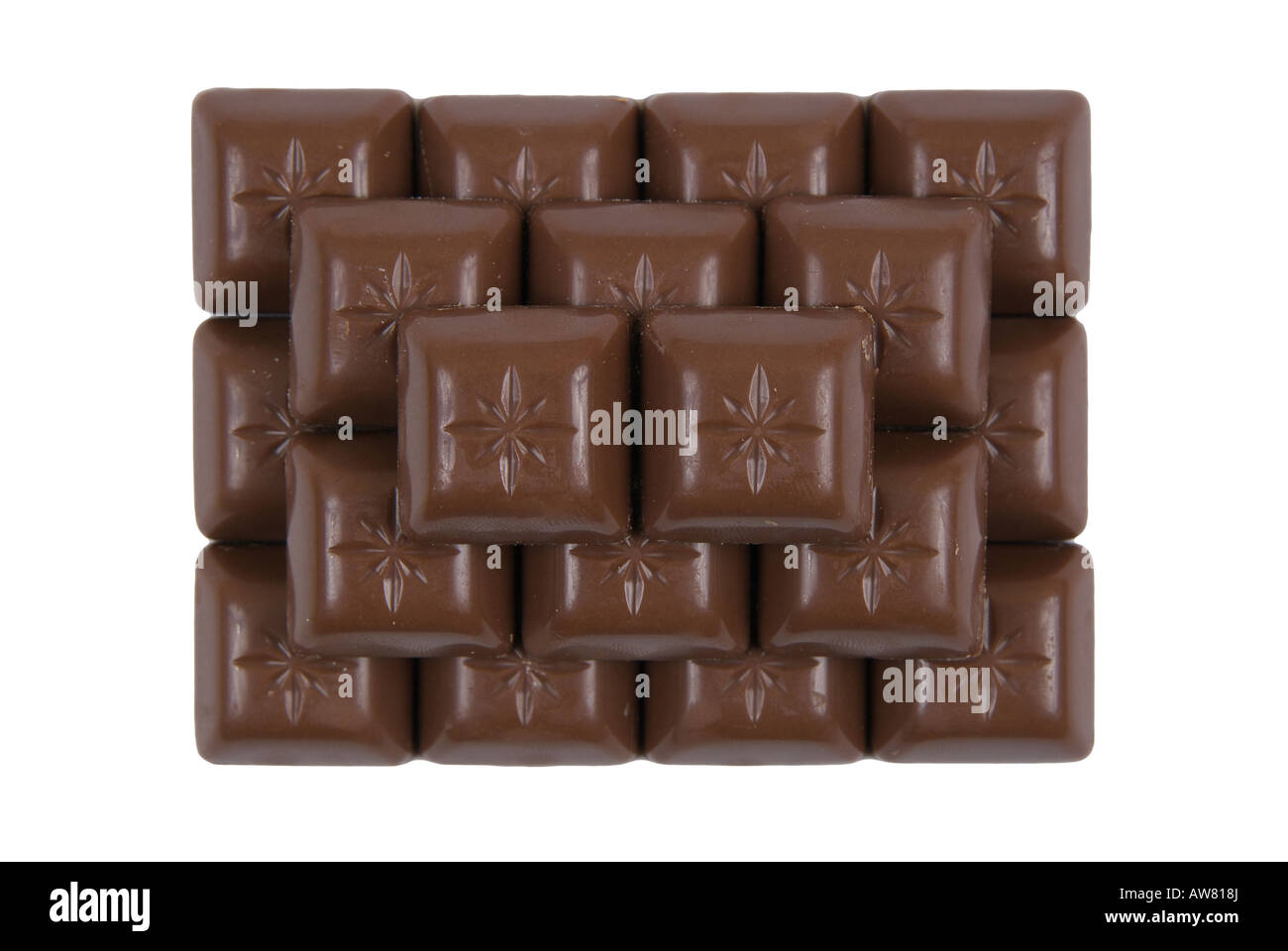 Chocolate forming a pyramid White background Stock Photo - Alamy
