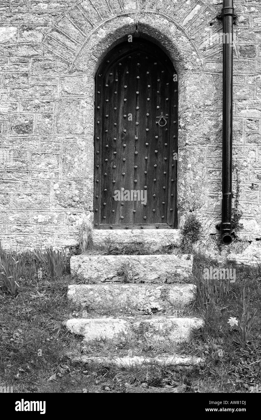 Side entrance of St Thomas a Becket Church at Bridford on Dartmoor National Park South Devon England in moochrome Stock Photo