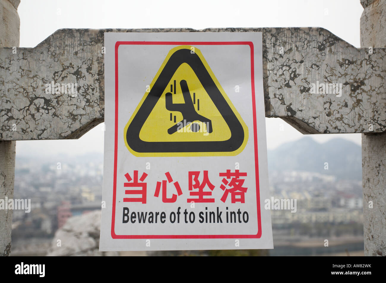 Danger Of Fall BEWARE OF TO SINK INTO Warning Sign In English And danger-of-fall-beware-of-to-sink-into-warning-sign-in-english-and