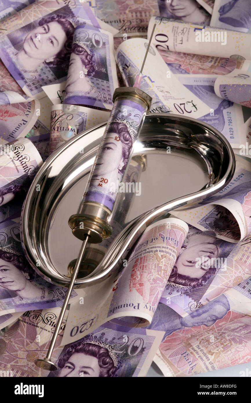 [Syringe containing bank note] Stock Photo