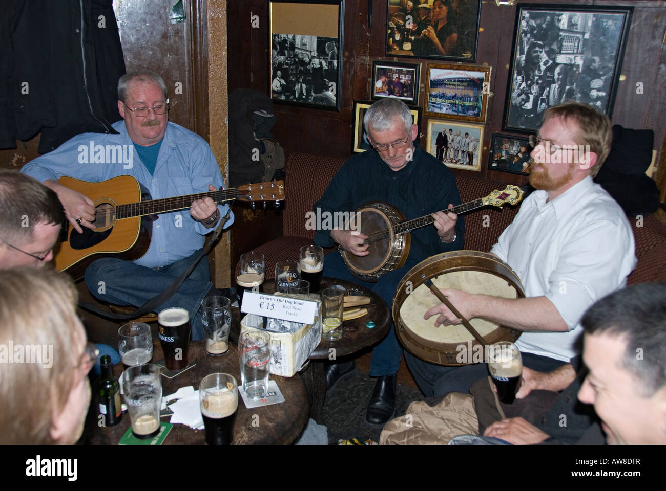 Musicians play traditional Irish folk music in a Dublin bar. Stock Photo