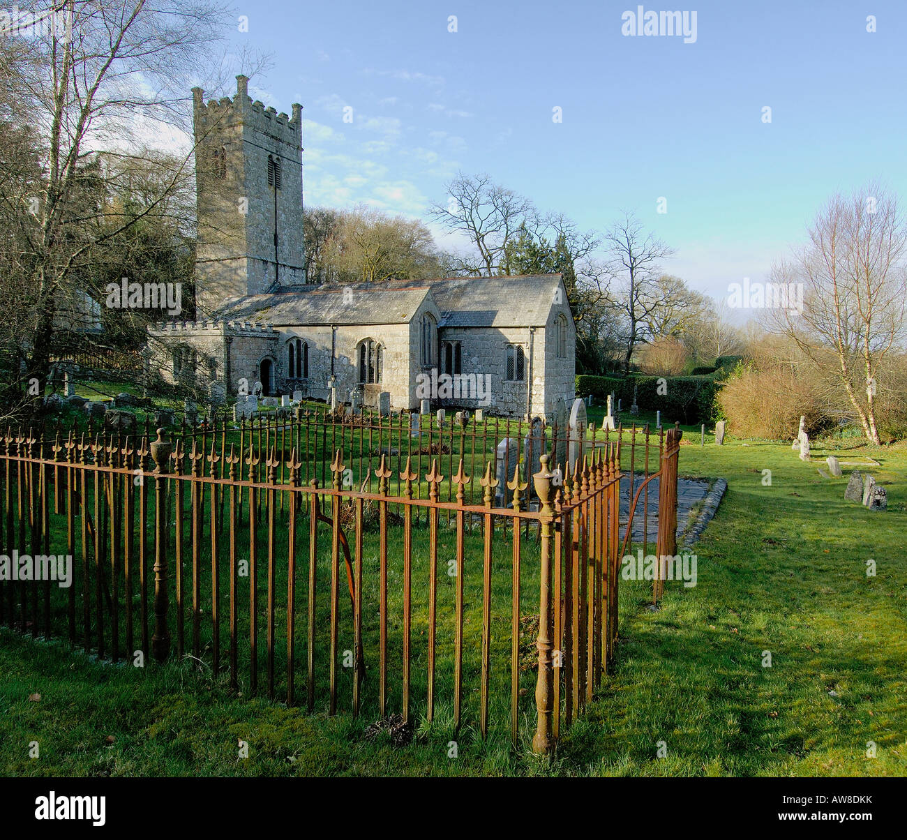 Holy Trinity Church at Gidleigh on Dartmoor National Park South Devon England with a rusty metal enclosure in the foreground Stock Photo