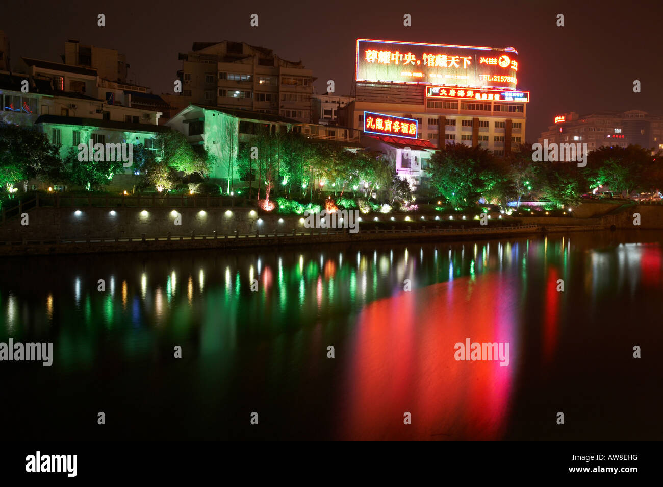 Guilin city with river reflections at night in Guangxi region of the Peoples Republic of China PRC Stock Photo