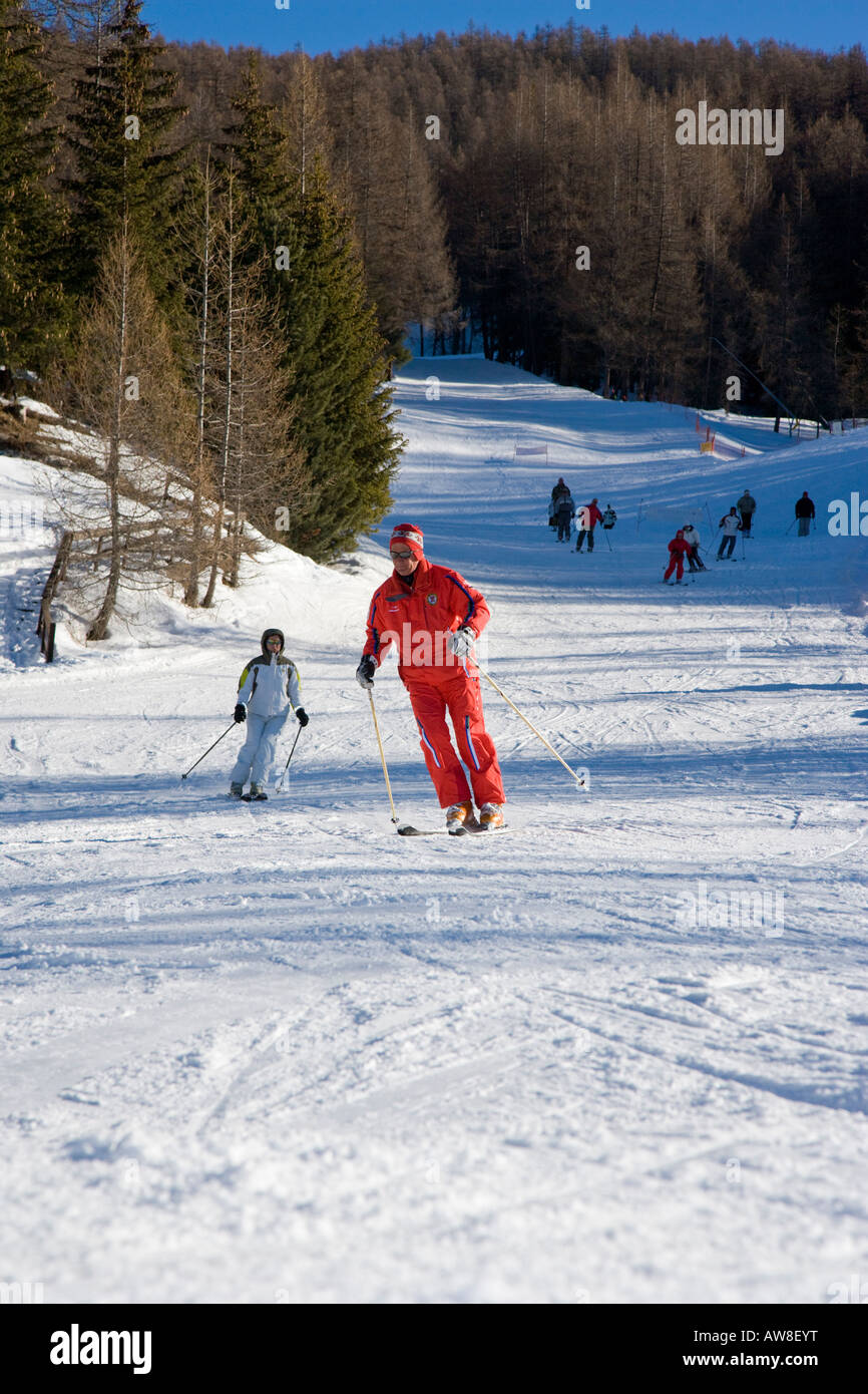 Ski instructor on Clotes piste Sauze d Oulx Piemonte Italy Stock Photo