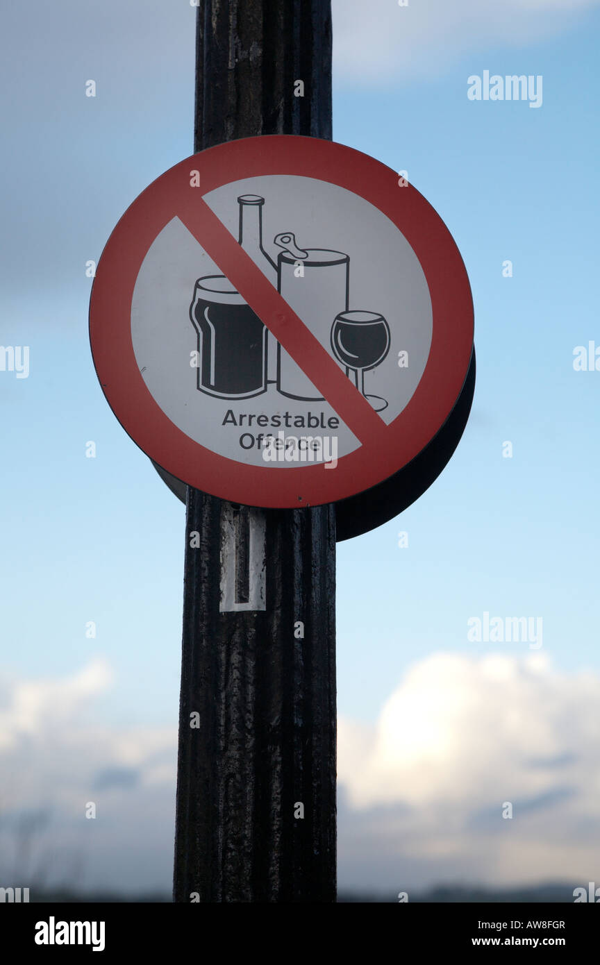 sign on a lamp post prohibiting the consumption of alcohol in a town ...