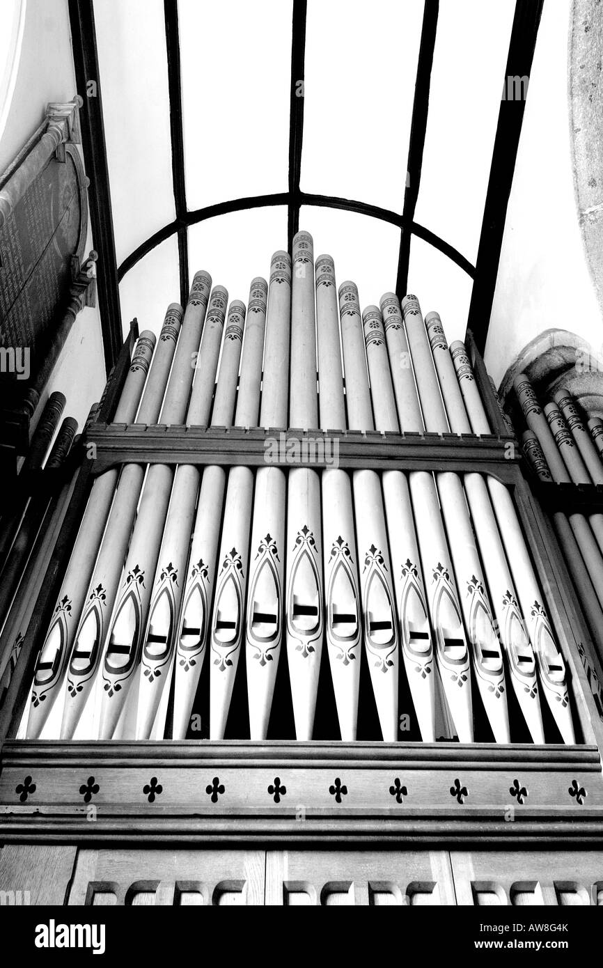 Decorative organ pipes in St James Church at Christow on Dartmoor South Devon from below in monochrome Stock Photo