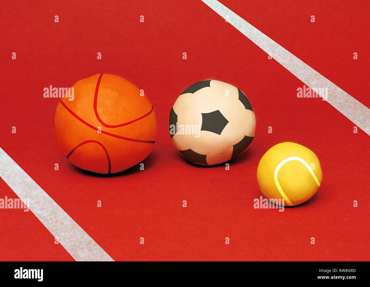 A basketball, a soccer ball, and a tennis ball Stock Photo Alamy
