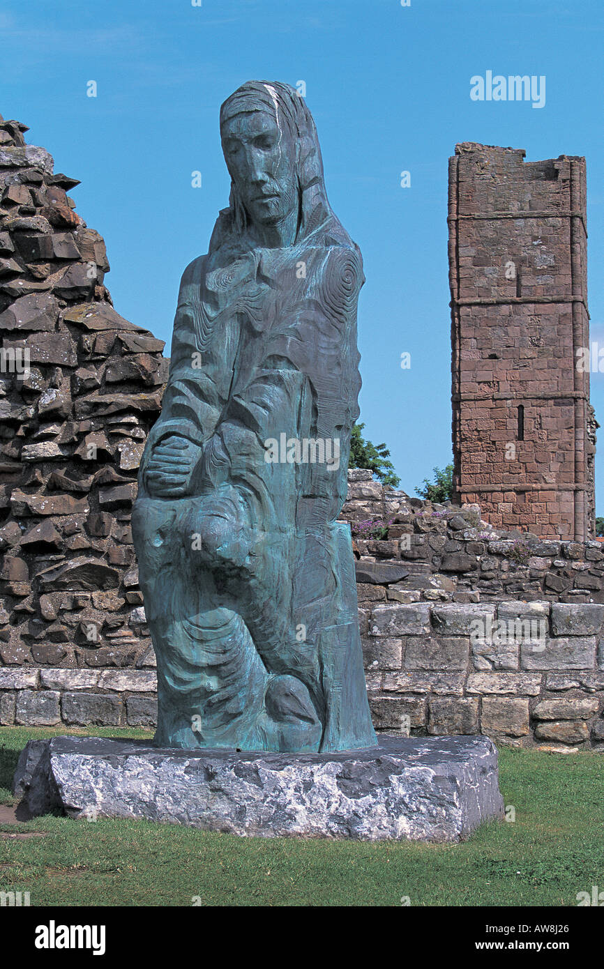 Saint Cuthbert of Farne Bronze sculpture by Fenwick Lawson at Lindisfarne Priory Holy Island Northumberland England Stock Photo