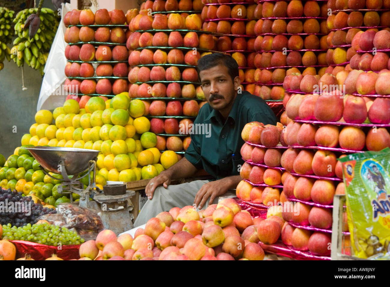Mysore fruit market with various apples and citrus fruits piled high