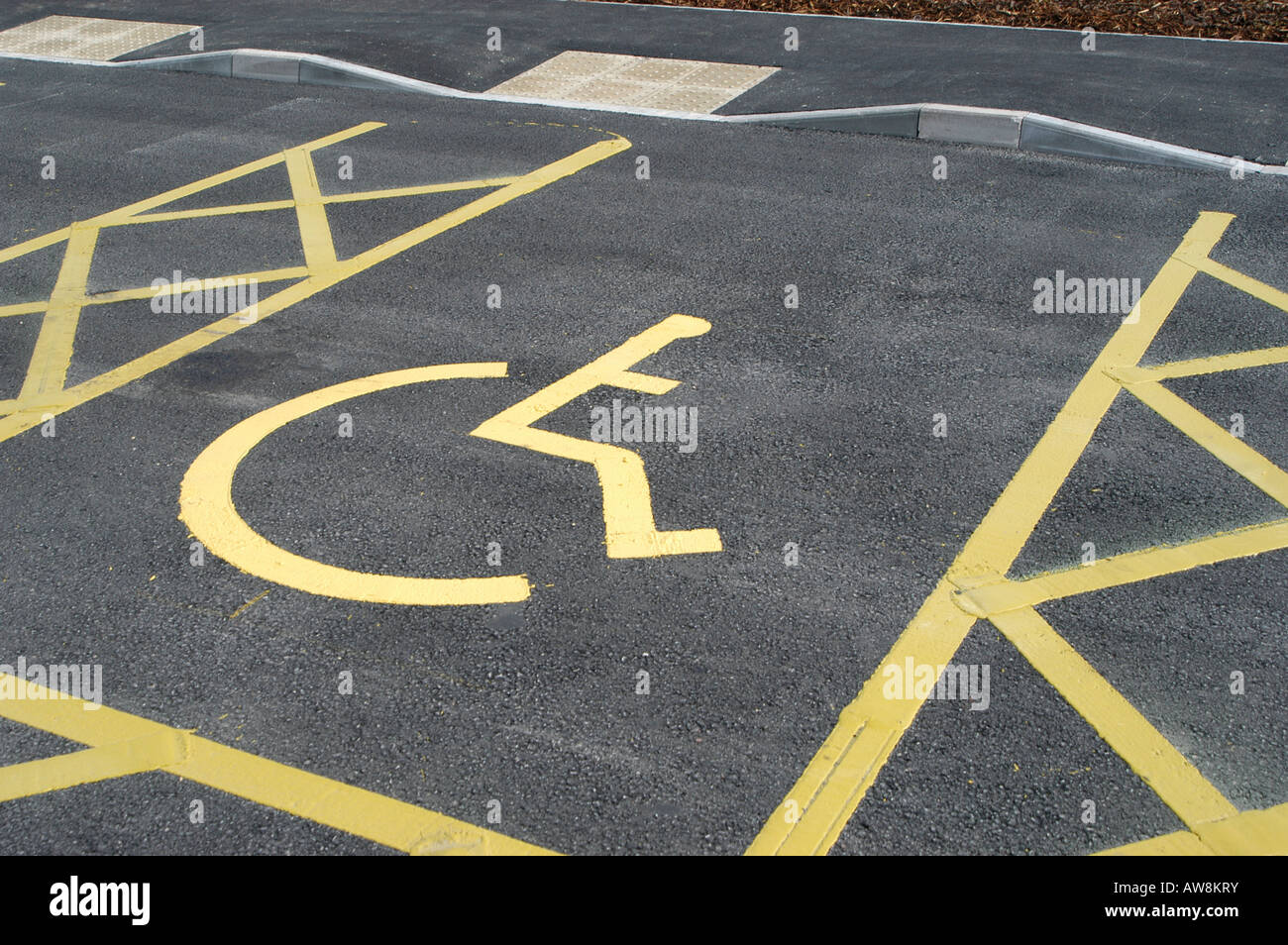 road marking in a car park indicating space reserved for disabled
